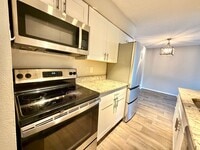 Building Photo - Quiet & Private Condo Retreat in the Heart...