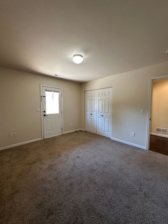 Building Photo - Three Bedroom Two and One Half Bath Duplex...