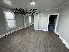 Building Photo - Two-bedroom house that includes a large garage.