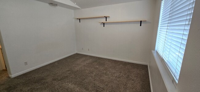 Building Photo - 8084 N Ridge Loop E
