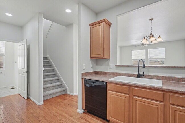 Building Photo - Beautifully Updated 3-Bedroom End-Unit Townhome Facing Open Space with Attached 2-Car Garage in G...