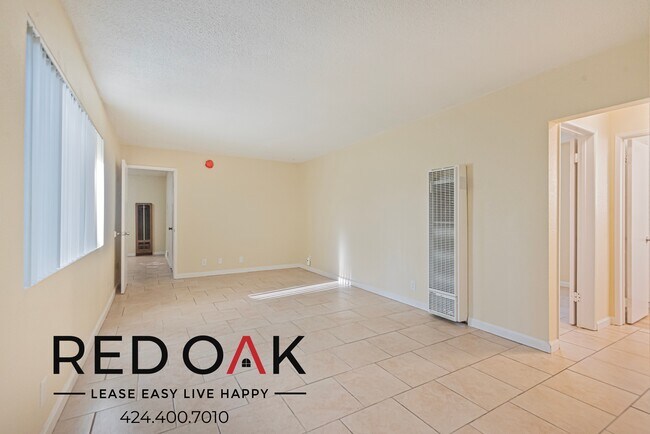 Building Photo - Spacious Two Bedroom with Tile Floors, Lar...
