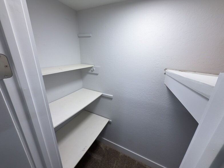Large closet with built-in shelving system - 2006 Candle Ct