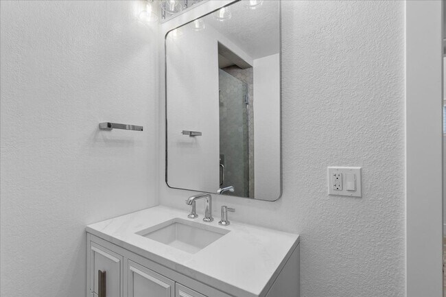 Building Photo - COMPLETELY REMODELED, BRIGHT & AIRY, TRI-LEVEL HOME W/ TOP-FLOOR GREAT ROOM LIVING SPACE, 2-CAR G...