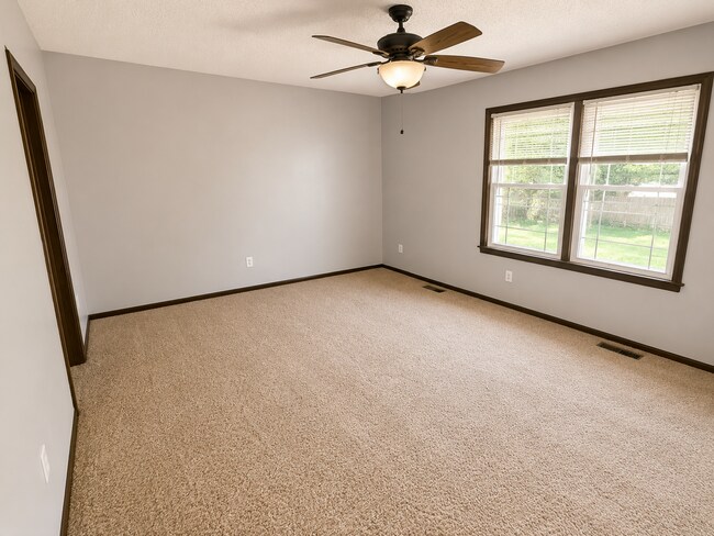 Building Photo - Spacious West Manhattan Home with Modern Updates, Oversized Garage & Prime Location
