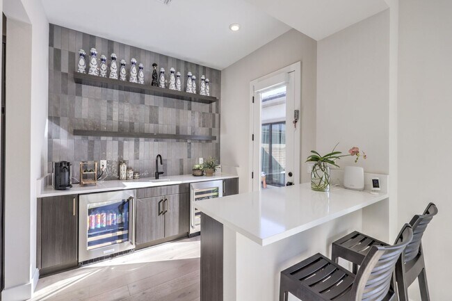 Building Photo - Exquisite 6-bed/ 6-bath residence nestled within the prestigious, guard-gated community of Revere...