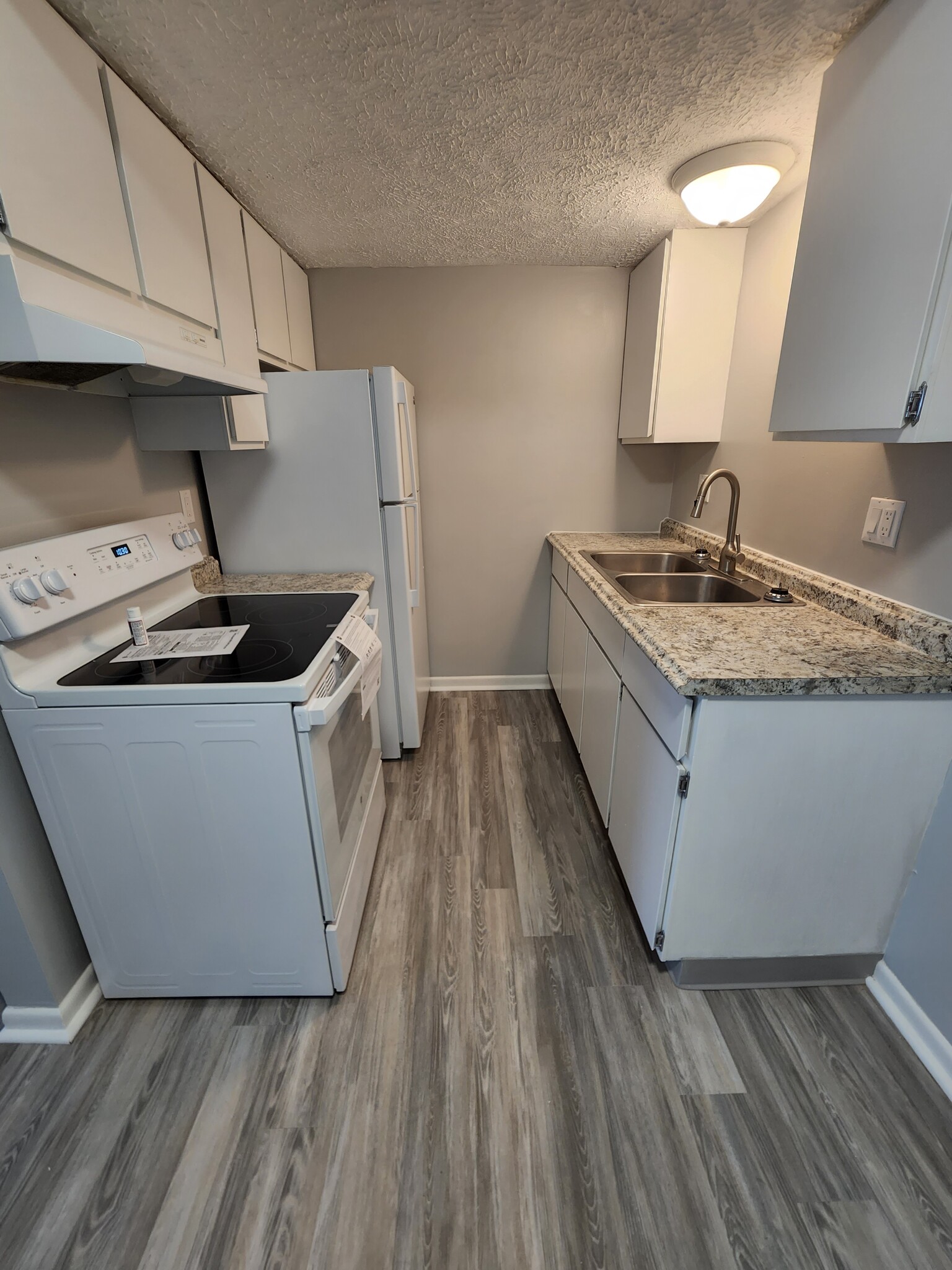 Kitchen - Whispering Pine Apartments