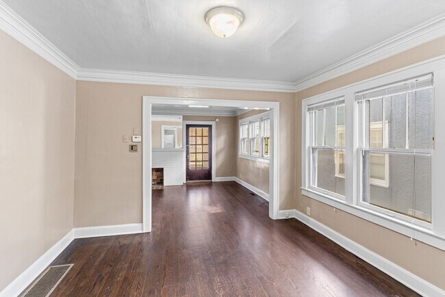 Building Photo - Charming 2-Bed Home with Hardwood Floors & Bright, Open Living Spaces!