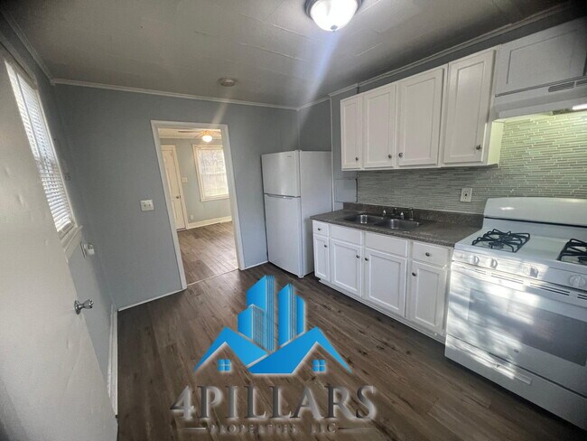 Building Photo - Charming 2 Bedroom Duplex in La Porte with Spacious Layout and Prime Location