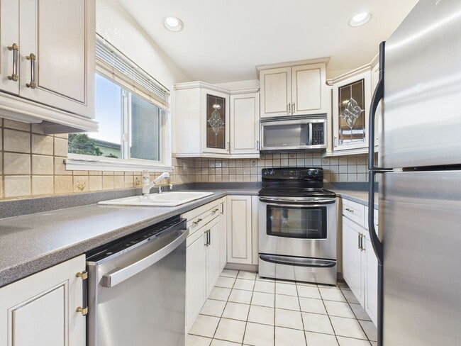 Building Photo - Beautiful condo now available at Cypress Grove.