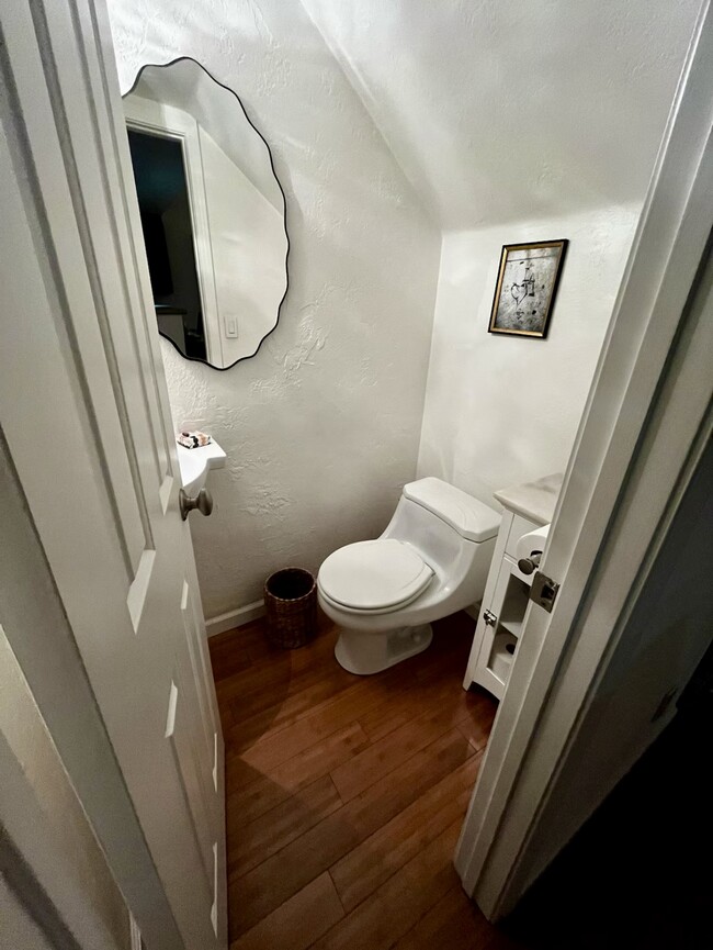 Downstairs half bath - 10926 Bluffside Dr