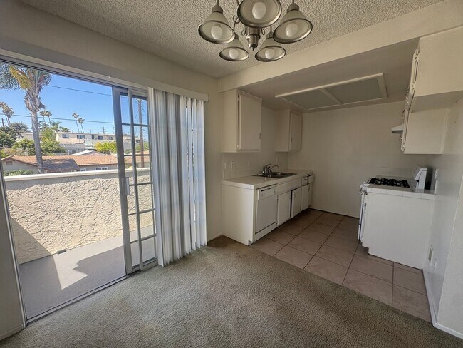 Building Photo - $2,395! Spacious Upstairs 2 Bedroom, 2 Bathroom Apartment with 2-Car Garage! 90710
