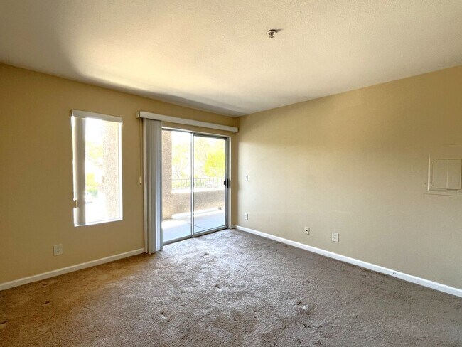 Building Photo - 1BR Condo with Private Balcony, Central A/C & Community Amenities in Corona
