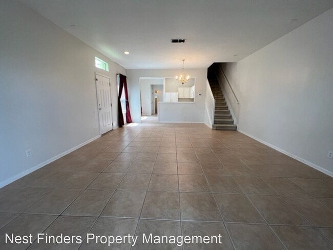 Building Photo - 3 br, 2.5 bath House - 7499 Scarlet Ibis Lane