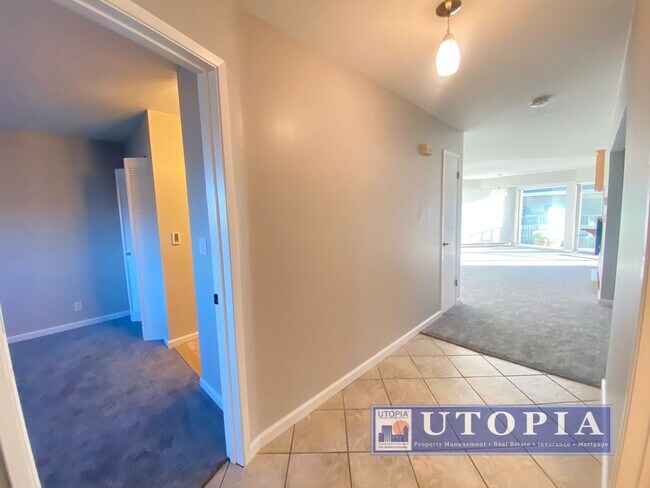 Building Photo - Ocean Views: 2Bd/2Ba + Office - Sunny, Top Floor Condo, Deck, Pool & Hot Tub