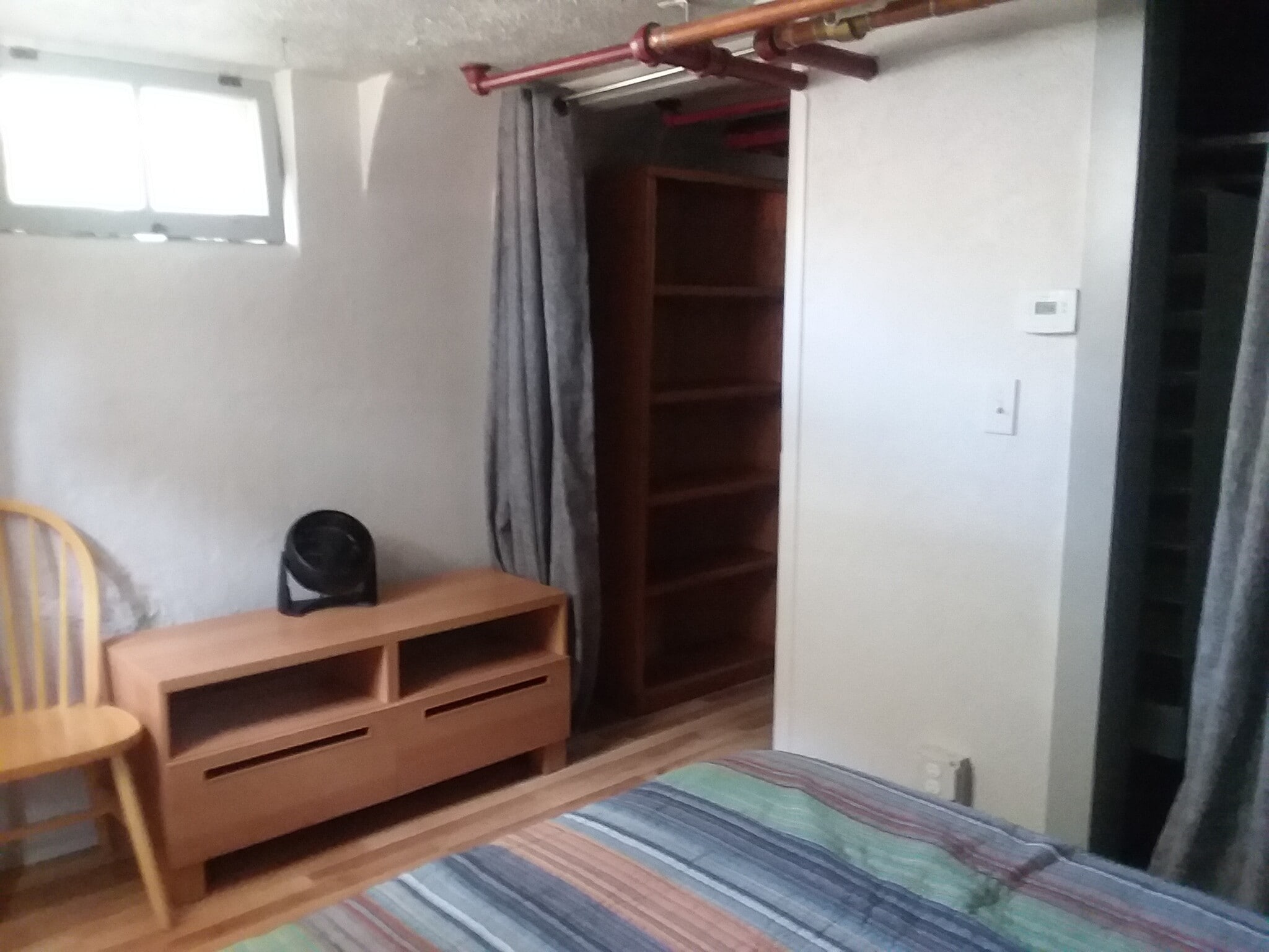 door curtain btwn bed & living area - 509 E Myrtle St
