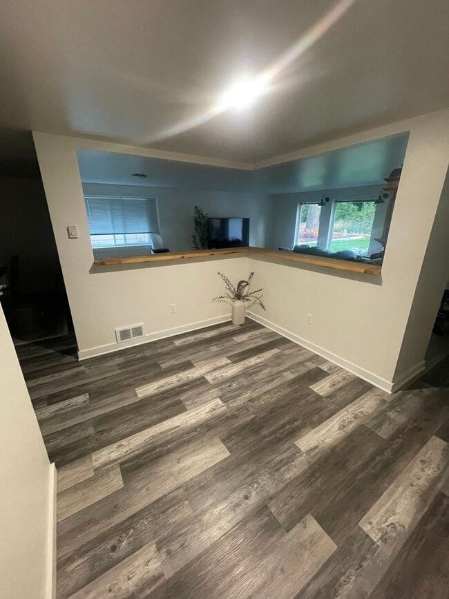 Building Photo - Charming 4-Bedroom with Open Floor Plan & ...