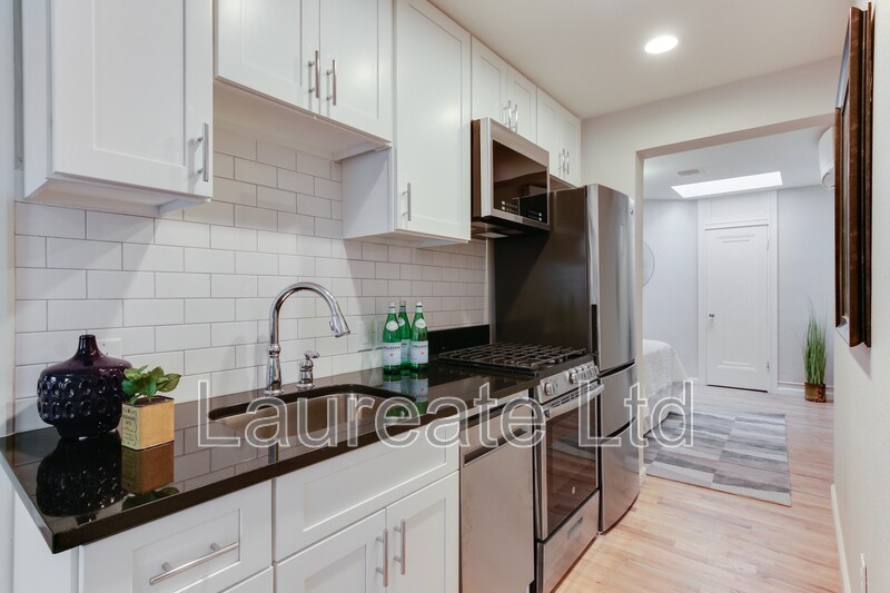 Building Photo - 1234 E Colfax Ave