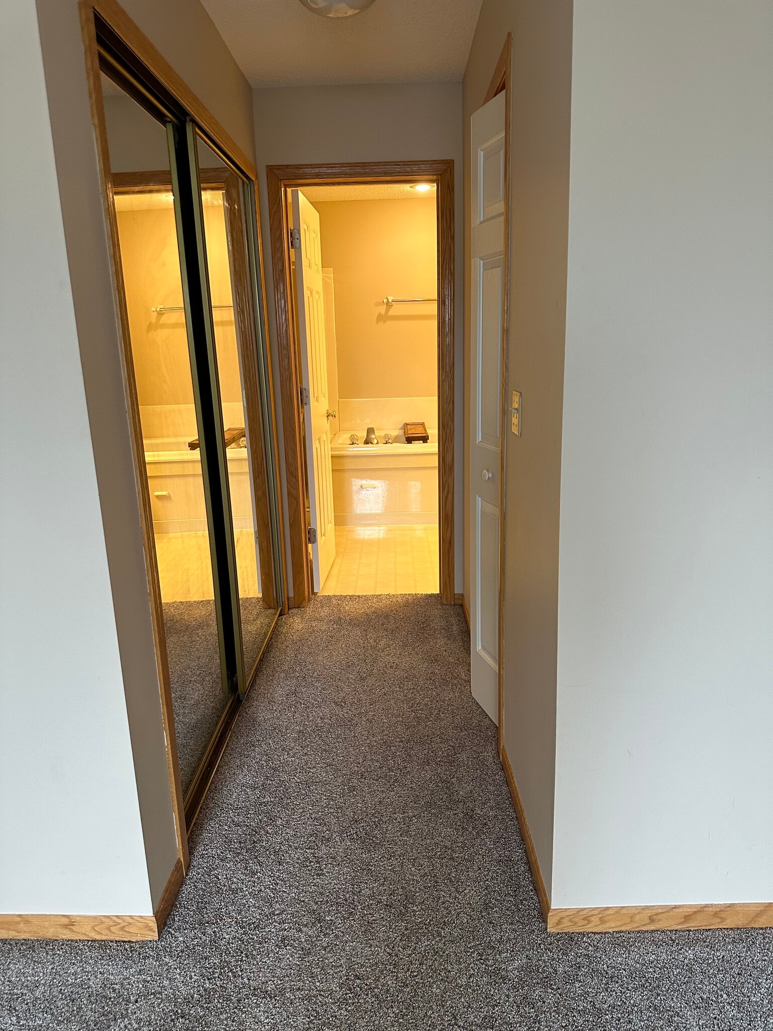 In main bedroom closets and bath - 15100 Dunwood Trl