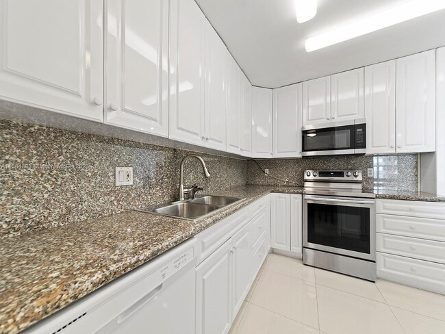 Building Photo - 9801 Collins Ave