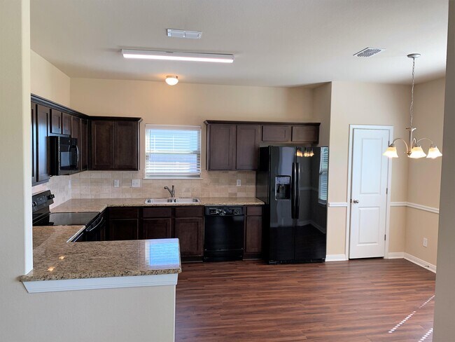 Building Photo - 7021 Tanglehead Dr