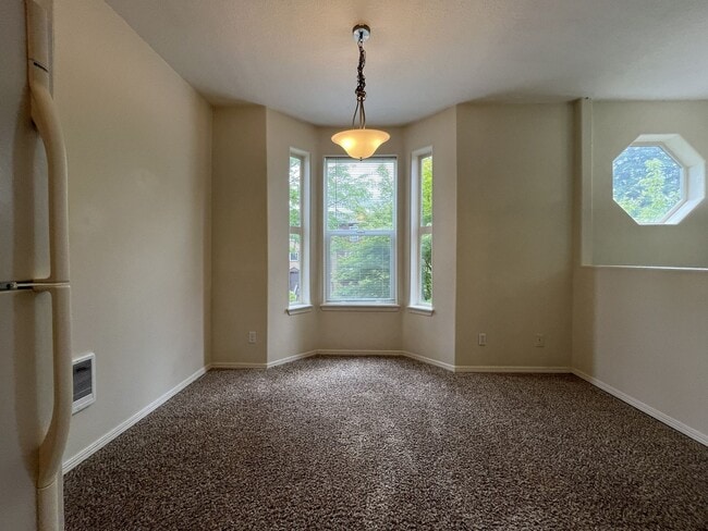 Building Photo - Spacious Three-Story Townhome Near Orenco Station with Attached Garage, Private Balcony, and Vaul...