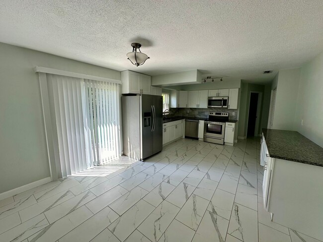 Building Photo - Fully remodeled 3/2 home for rent in the heart of Port Orange