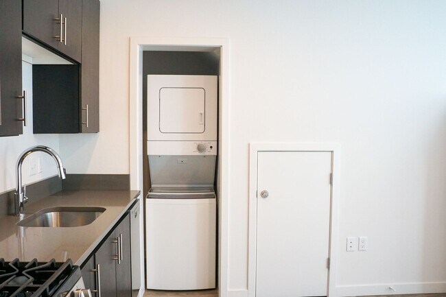 Building Photo - Modern & Sleek One-Bedroom Townhouse Ready...