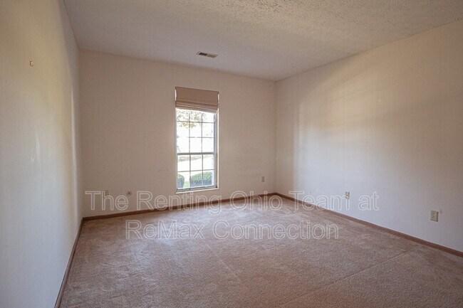 Building Photo - 6486 Reflections Dr