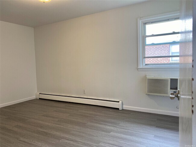 Building Photo - 160-15-16016 16th Ave