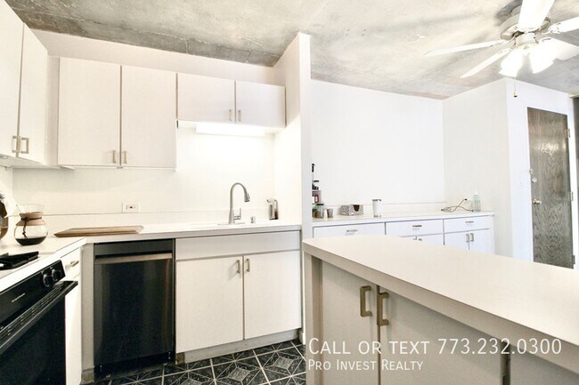 Building Photo - Available July 1st! Sun-filled Oversized 1...