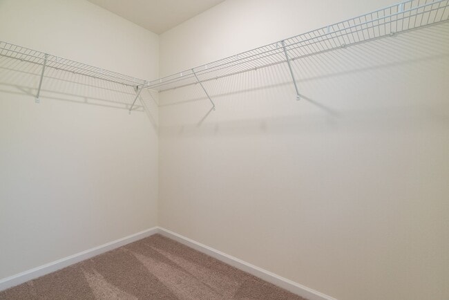 Building Photo - Super clean & spacious 4-bdrm/3-bath townhome in NE—Attached garage, great location