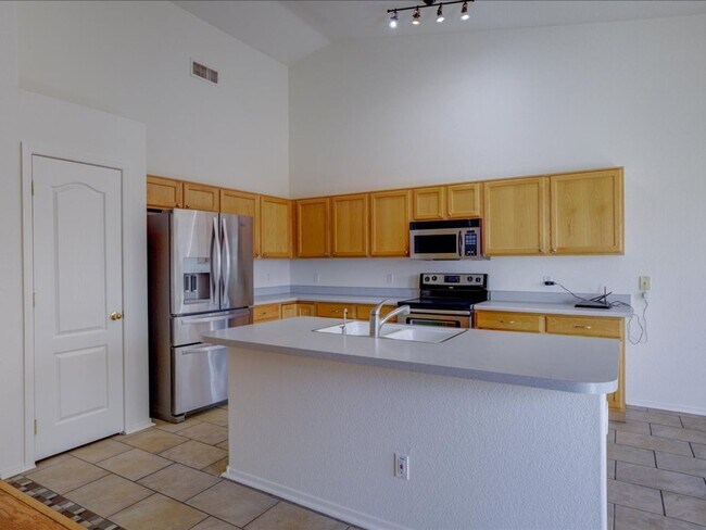 Building Photo - Ready Living: Solar Panels, EV Charging & Open-Concept Design!