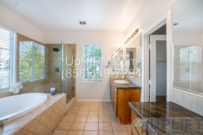 Building Photo - Spacious 5-Bedroom Home with Pool & Spa in...