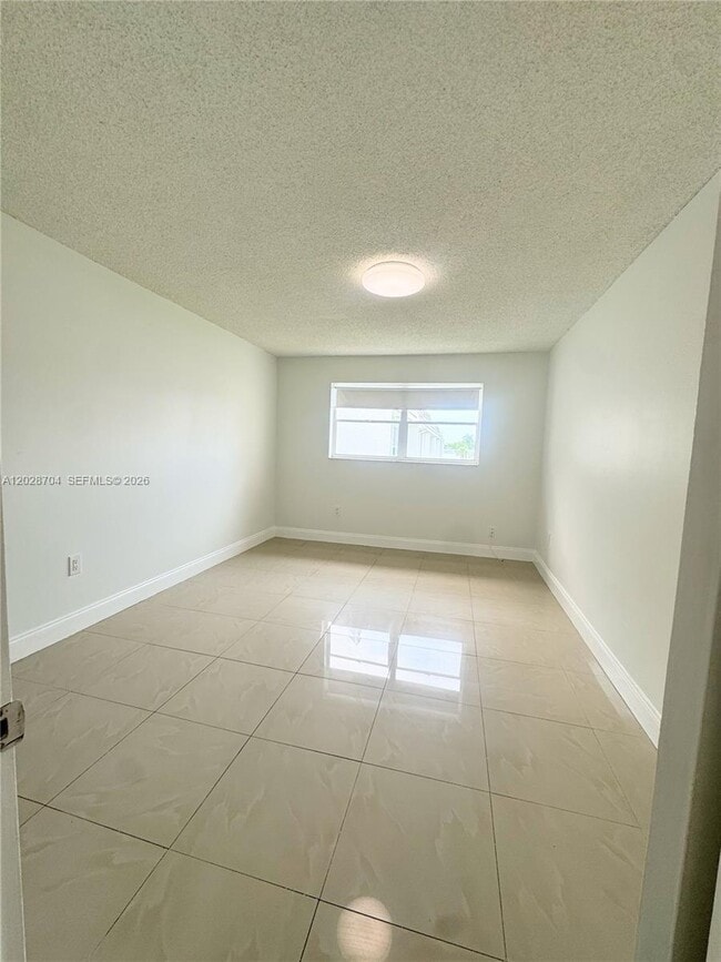 Building Photo - 8110 Sunrise Lakes Blvd