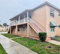 Building Photo - Palm Gardens - First Floor