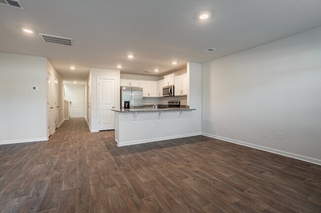 Building Photo - End unit! Available soon!