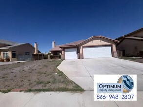 Building Photo - Spacious 4-Bedroom Home with Elegant Finishes & Convenient Location
