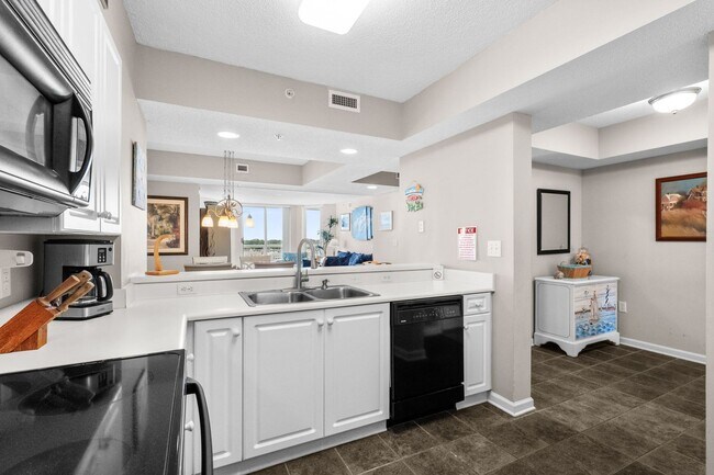 Building Photo - Spacious 3BR/3BA Coastal Retreat at Harbour Pointe – Utilities Included!