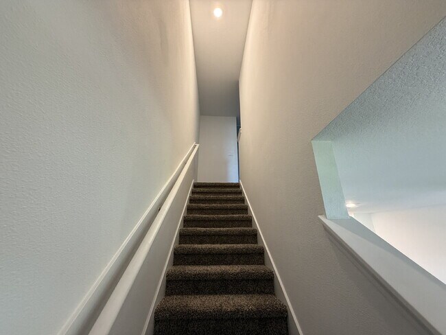 Building Photo - "Charming 2-Bedroom Townhouse Retreat with...