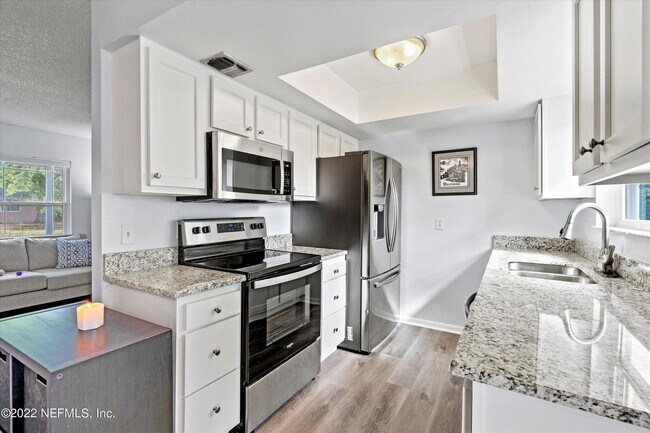 Building Photo - 8440 Frost St N