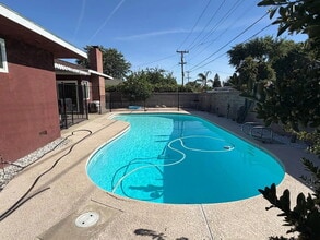 Building Photo - Spacious 4 Bedroom, 3 Bathroom Home with a Pool!