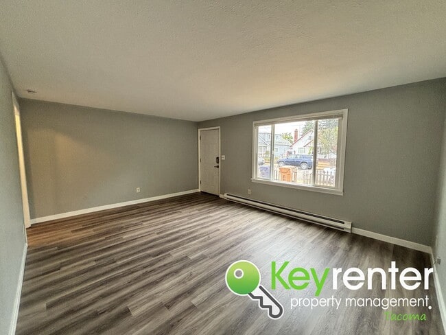 Building Photo - 4 Bedroom 2 Bathroom Tacoma Rental with Ga...
