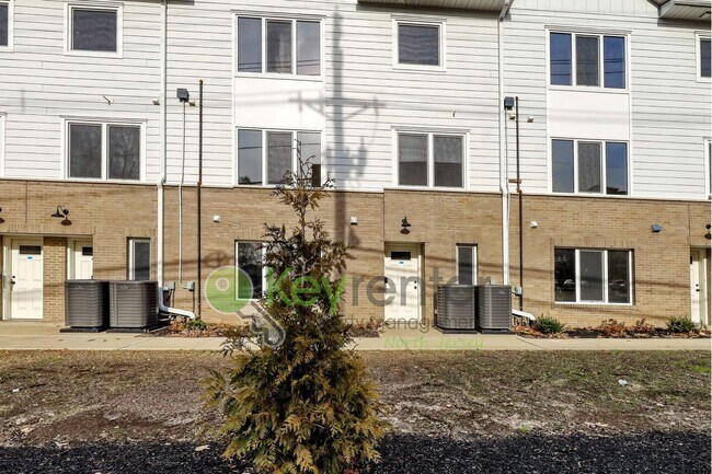 Building Photo - First Month Free Rent – Brand New 2BR/3BA Townhome with Garage