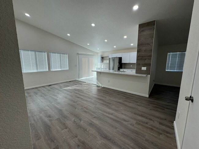 Building Photo - Freshly Remodeled 4 bedroom in Red Rock- RV Parking, low maintenance yard and pets welcome!