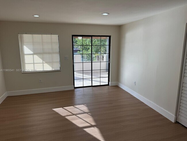 Building Photo - 7520 W 15th Ct