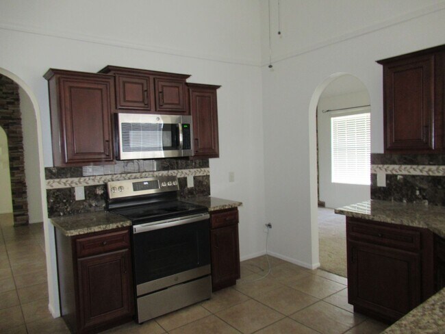 Building Photo - Nice 4 Bedroom + Den Home With Pool In AHW...