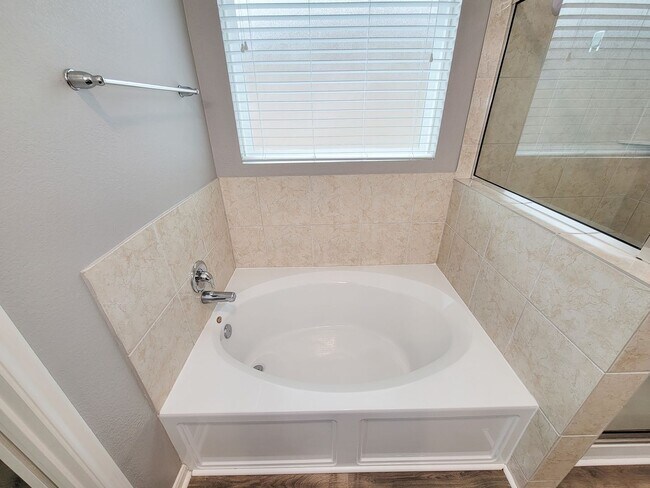 Building Photo - Welcome to this charming one-story home fe...
