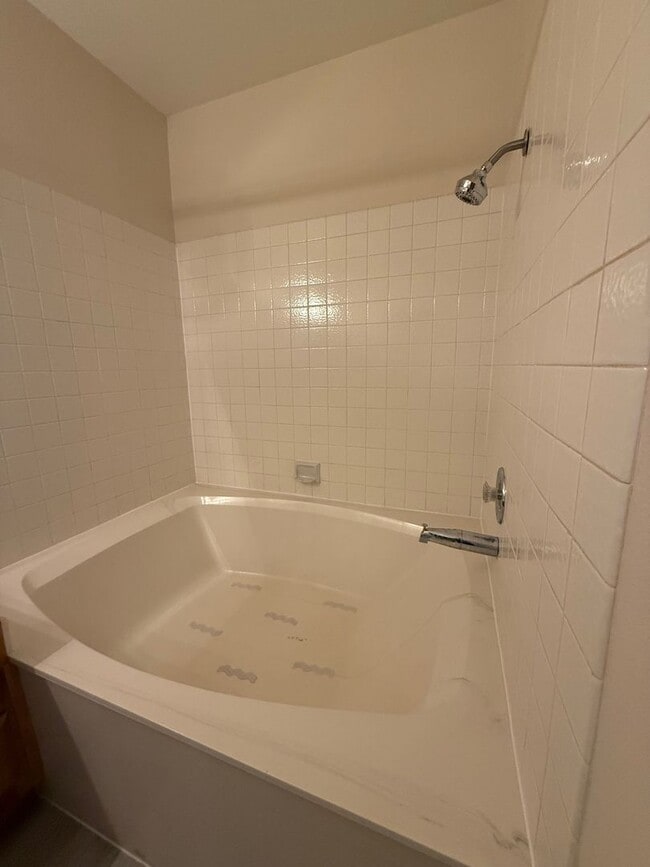 Building Photo - TWO BEDROOM TWO FULL BATH CONDO LOCATED IN A GATED COMMUNITY