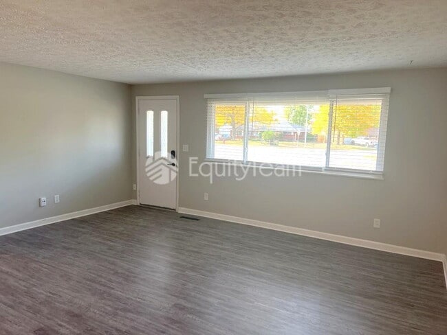 Building Photo - 5612 Harshmanville Rd